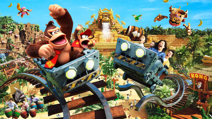 Donkey Kong Country area at Super Nintendo World Japan, showing Donkey and Diddy Kong riding in one mine cart and humans on another.