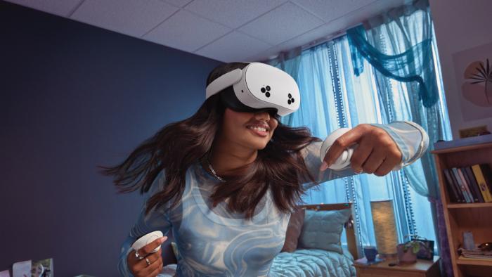 A lady using a VR headset.