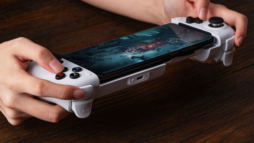 Closeup of the 8Bitdo Ultimate Mobile Gaming Controller, with someone’s hands playing a game.