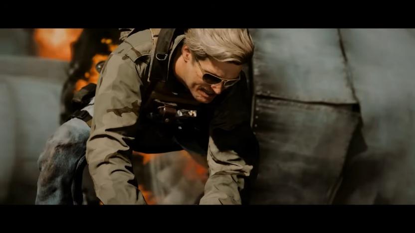 Screen from the Call of Duty: Black Ops 6 trailer. A guy with a mustache and sunglasses hunkers down behind cover.